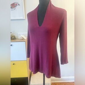 Premise; wine tunic in size S.